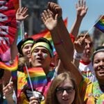 Members of Hopedale Gender Sexuality Alliance (GSA) cheer at the start of the Boston Pride Parade in Boston, MA on June 08, 2019.