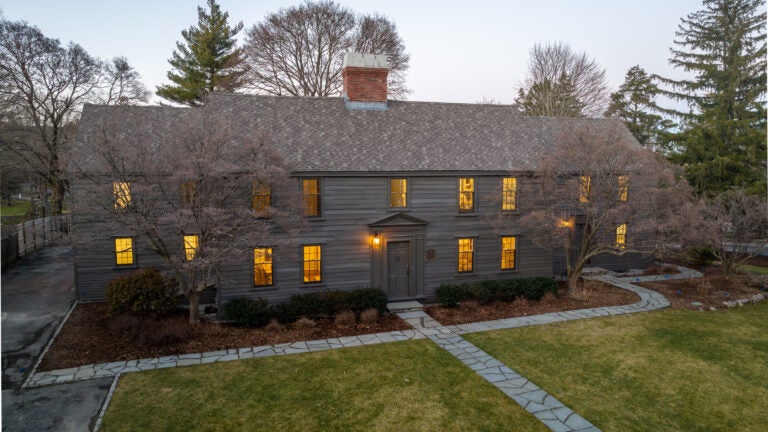 This Newton home was built between 1645 and 1730, but has since been renovated. Today, it is painted 