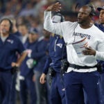 Brian Flores as a defensive coach for the Patriots.