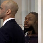 Csean Skerritt, 34, was arraigned in Dorchester Municipal Court Friday on murder and weapons charges stemming from the fatal shooting of 13-year-old Tyler Lawrence. He's shown standing in court with his attorney on the left.