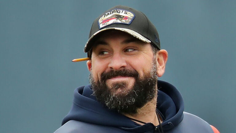 Foxborough 01/04/2023 Then New England Patriots held practice on their practice field at Gillette Stadium. Matt Patricia smiles during warmups.