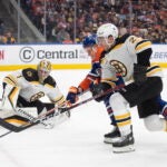 Jeremy Swayman and Garnet Hathaway stopping an Oilers attack for the Bruins.