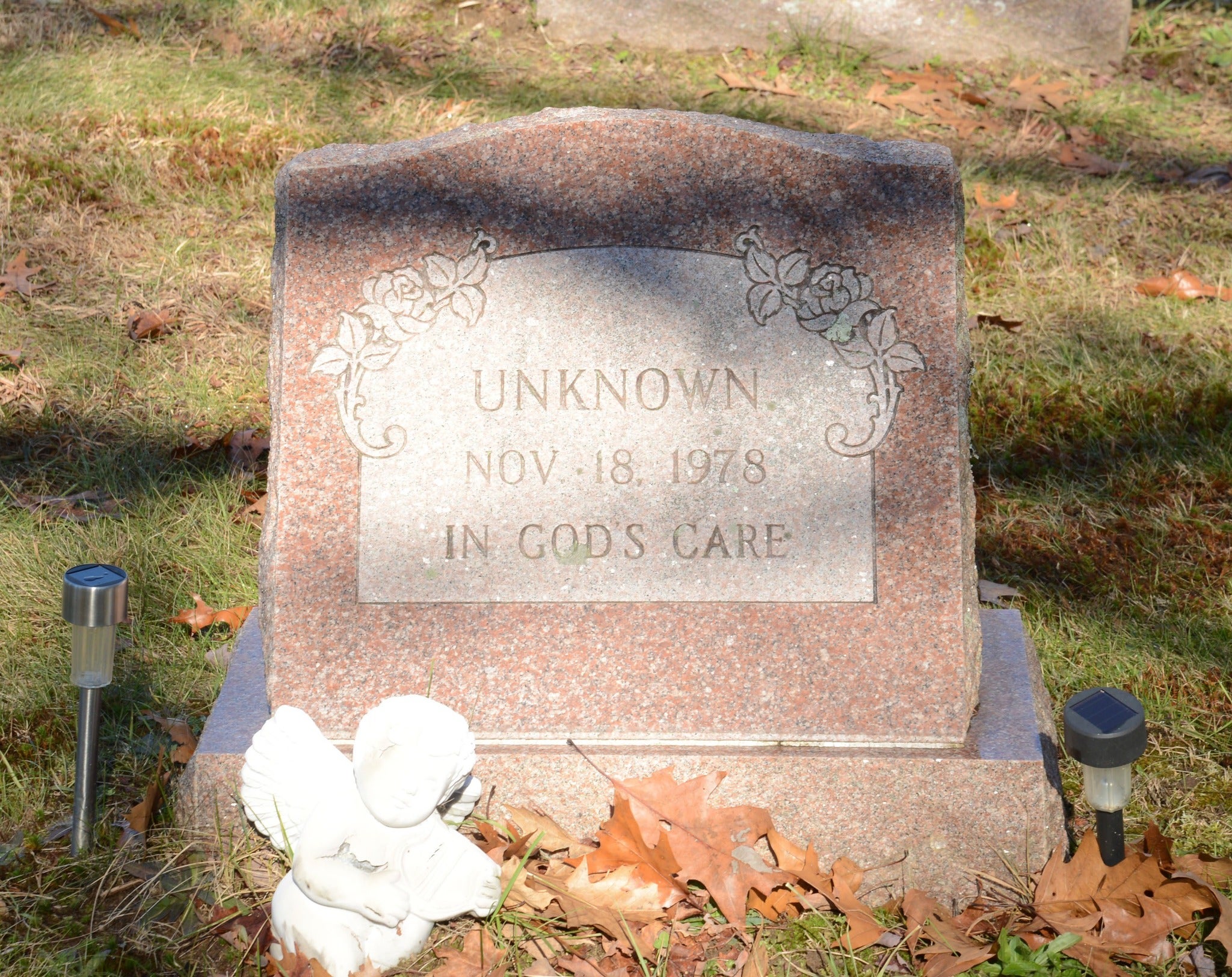 Patricia Ann Tucker's grave in Granby, Mass. The marker reads "Unknown. Nov. 18, 1978. In God's care." 