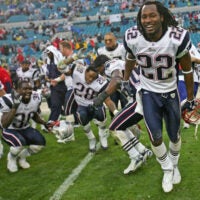 The New England Patriots Asante Samuel and his teammates James Sanders, Corey Dillon, and Ellis Hobbs celebrate their 24-21 victory over the Jacksonville Jaguars at Alltel Stadium on Sunday December 24, 2006.