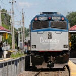 FILE - Amtrak's Downeaster train, headed from Boston to Portland, Maine, pulls out of the station in Haverhill, Mass., July 10, 2012.