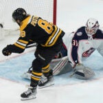 The Bruins David Pastrnak scores the winning goal