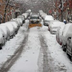 A snow plow on Beacon Hill.