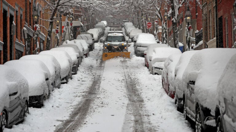 A snow plow on Beacon Hill.