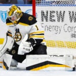 Bruins goaltender Jeremy Swayman (1) makes a save