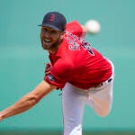 Boston Red Sox starting pitcher Chris Sale throws in the first inning of their spring training baseball game against the Detroit Tigers in Fort Myers, Fla., Monday, March 6, 2023.