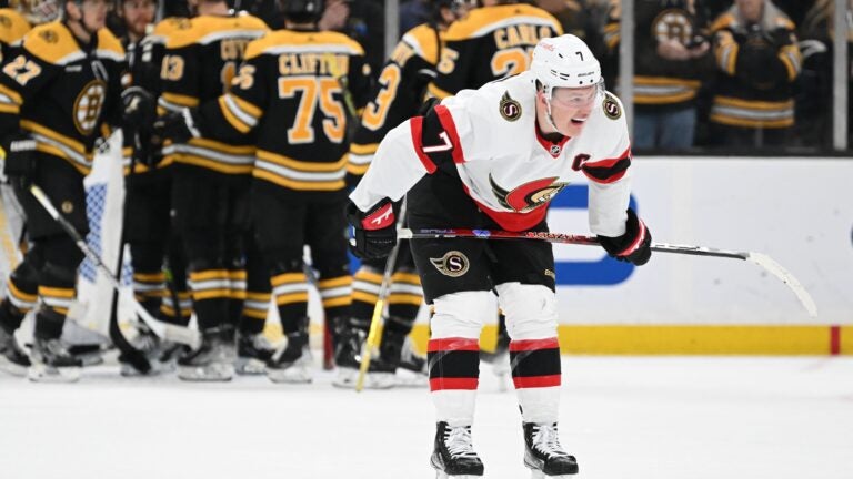 Brady Tkachuk #7 of the Ottawa Senators skates off of the ice after losing to the Boston Bruins at the TD Garden.