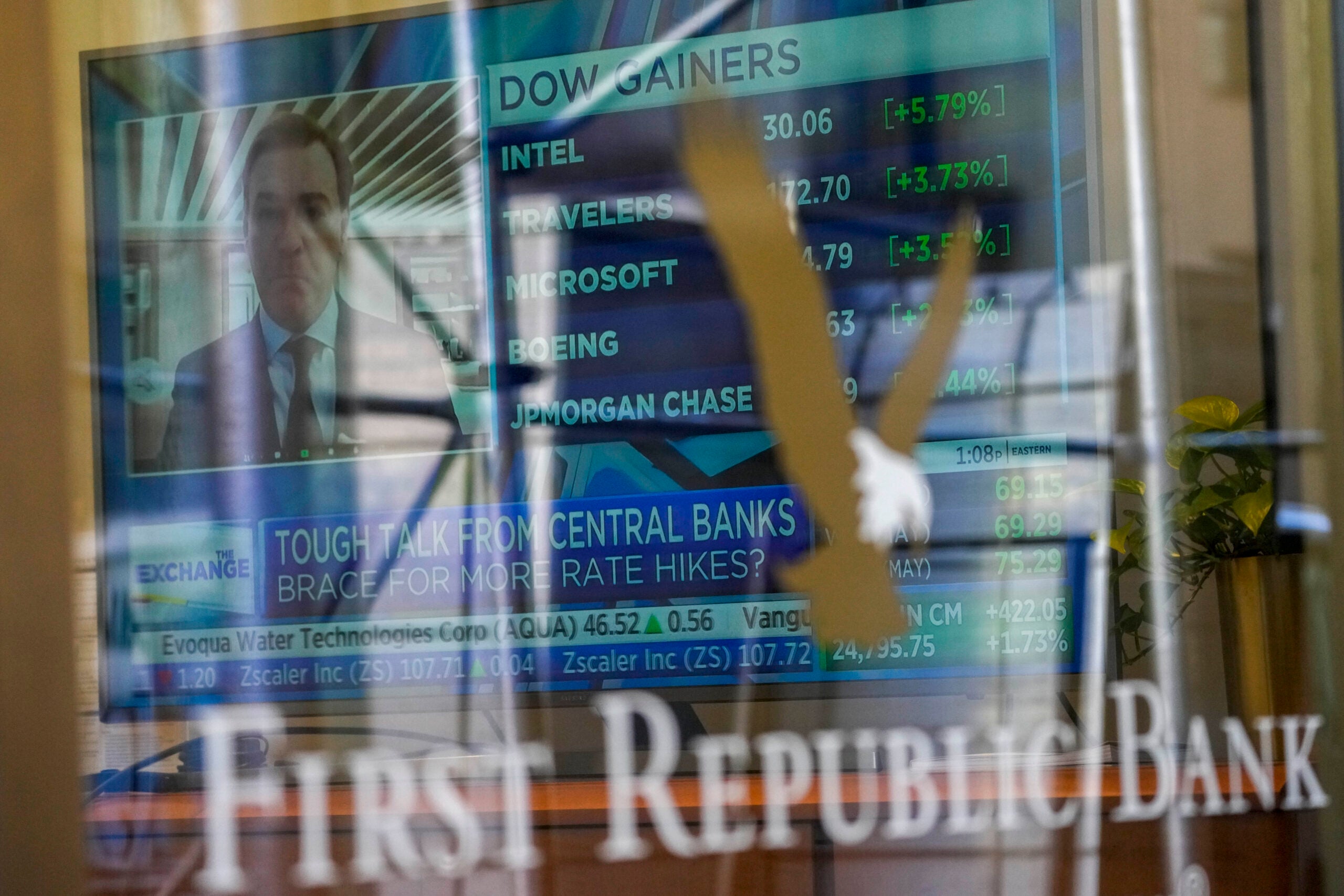 A television screen displaying financial news