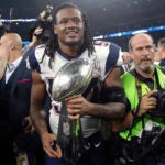 New England Patriots' Dont'a Hightower holds the Vince Lombardi Trophy after the NFL Super Bowl 51 football game against the Atlanta Falcons Sunday, Feb. 5, 2017, in Houston. The Patriots won 34-28.