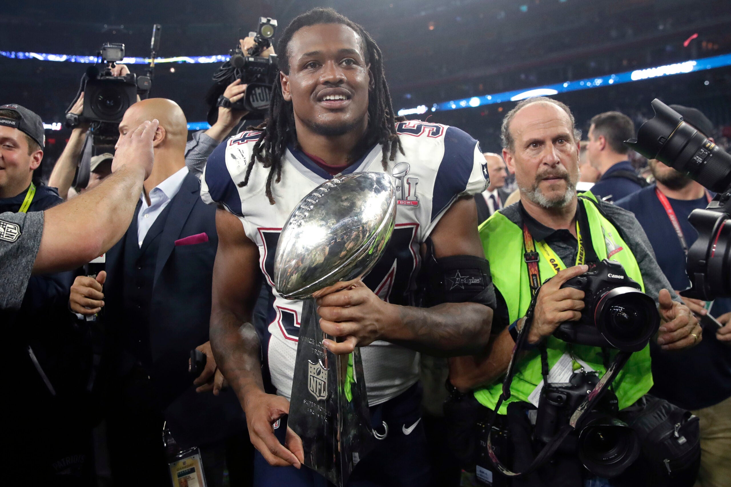 New England Patriots' Dont'a Hightower holds the Vince Lombardi Trophy after the NFL Super Bowl 51 football game against the Atlanta Falcons Sunday, Feb. 5, 2017, in Houston. The Patriots won 34-28.