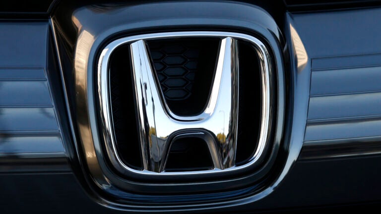 The logo of Honda Motor Co. is seen on a Honda vehicle.