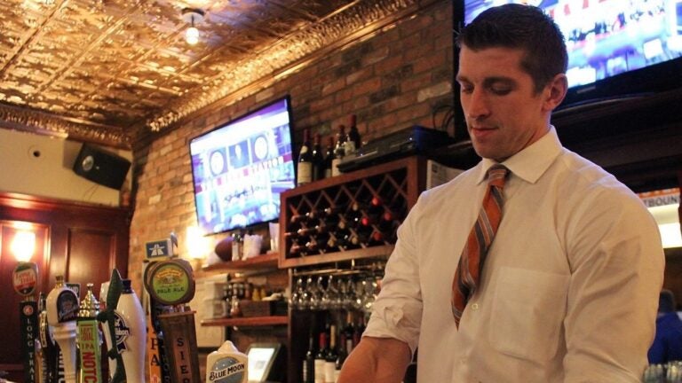 A bartender at J.J. Foley's Cafe.