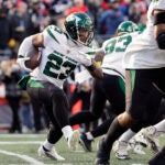 New York Jets' James Robinson runs against the New York Jets during an NFL football game at Gillette Stadium, Sunday, Nov. 20, 2022 in Foxborough, Mass.