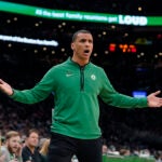 Boston Celtics head coach Joe Mazzulla shouts from the bench in the first half of an NBA basketball game against the New York Knicks, Sunday, March 5, 2023, in Boston.