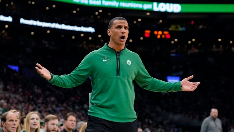 Boston Celtics head coach Joe Mazzulla shouts from the bench in the first half of an NBA basketball game against the New York Knicks, Sunday, March 5, 2023, in Boston.