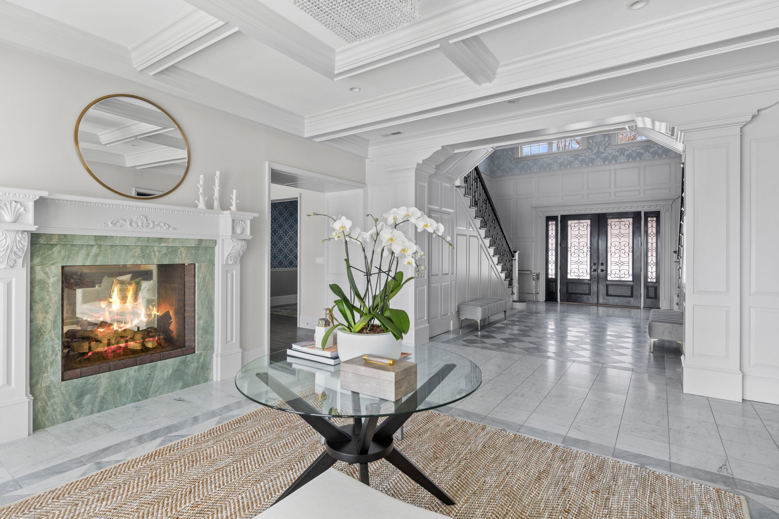 This gas fireplace is one of three inside this 10,000-square-foot home.
