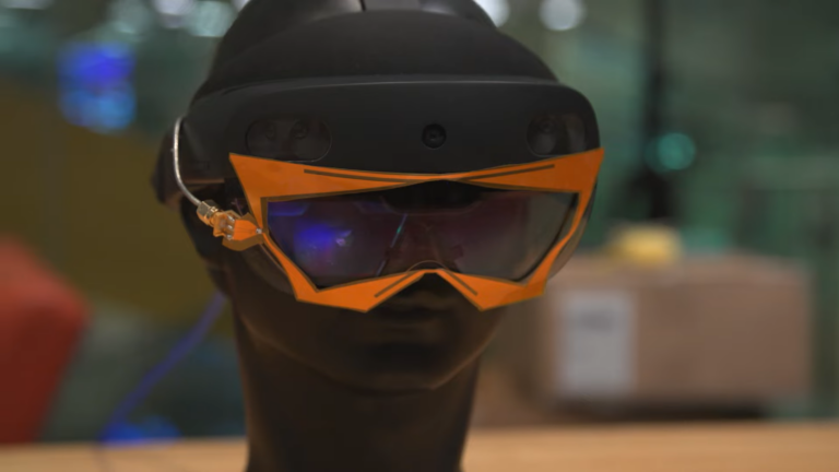 An augmented reality headset outfitted with new technology from MIT that allows X-ray vision.