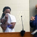 Justelino Resende, 38, left, was arraigned in Brockton District Court on Tuesday. His attorney, Daniel Pond, is pictured at right.