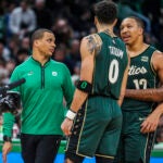 BOSTON, MA - 11/23/2022 Celtics Coach Joe Mazzulla talks to Boston Celtics forward Jayson Tatum (0), Boston Celtics forward Grant Williams (12) and Boston Celtics guard Marcus Smart (36) during a time out in the fourth quarter of Wednesday’s game at TD Garden.