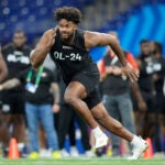 Ohio State offensive lineman Paris Johnson Jr. runs a drill at the NFL football scouting combine in Indianapolis, Sunday, March 5, 2023.