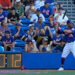 one of the new baseball rule changes is the pitch clock seen here.