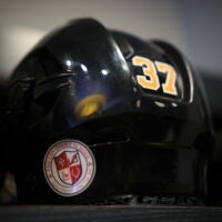 Patrice Bergeron's helmet featured the insignia of the Covenant School on Tuesday.