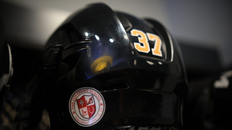Patrice Bergeron's helmet featured the insignia of the Covenant School on Tuesday.