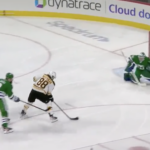 David Pastrnak skates in against Frederik Andersen.