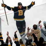 The Bruins David Pastrnak celebrates with the fans followng his third period goal, which turned out to be the game winner, giving Boston a 4-3 lead. The Boston Bruins hosted the New Jersey Devils in a regular season NHL hockey game at the TD Garden.