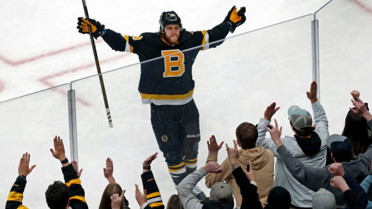 The Bruins David Pastrnak celebrates with the fans followng his third period goal, which turned out to be the game winner, giving Boston a 4-3 lead. The Boston Bruins hosted the New Jersey Devils in a regular season NHL hockey game at the TD Garden.