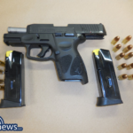 A loaded 9mm Taurus GC3 handgun along with an additional loaded magazine.