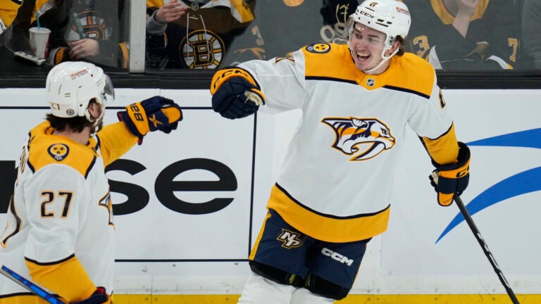 Against the Bruins, Nashville Predators center Cody Glass, right, is congratulated by Ryan McDonagh