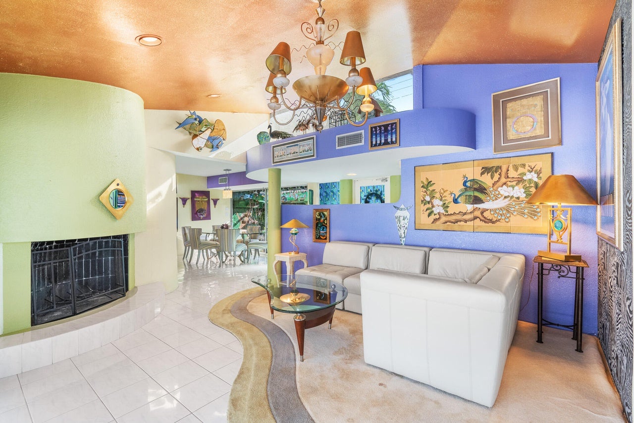 Colorful, curved walls are a landmark of this home.