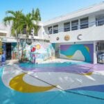 From above, the 4,539-square-foot house at 2601 NE 36th St. in Lighthouse Point, FL is painted in swirls of cyan, lavender, and indigo.