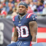 Mack Wilson on the sideline during a Patriots-Ravens game in 2022.