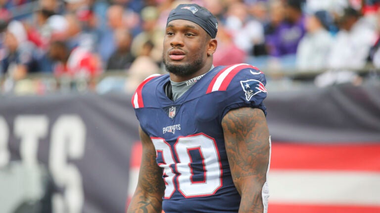 New England Patriots linebacker Mack Wilson Sr. (30) looks on