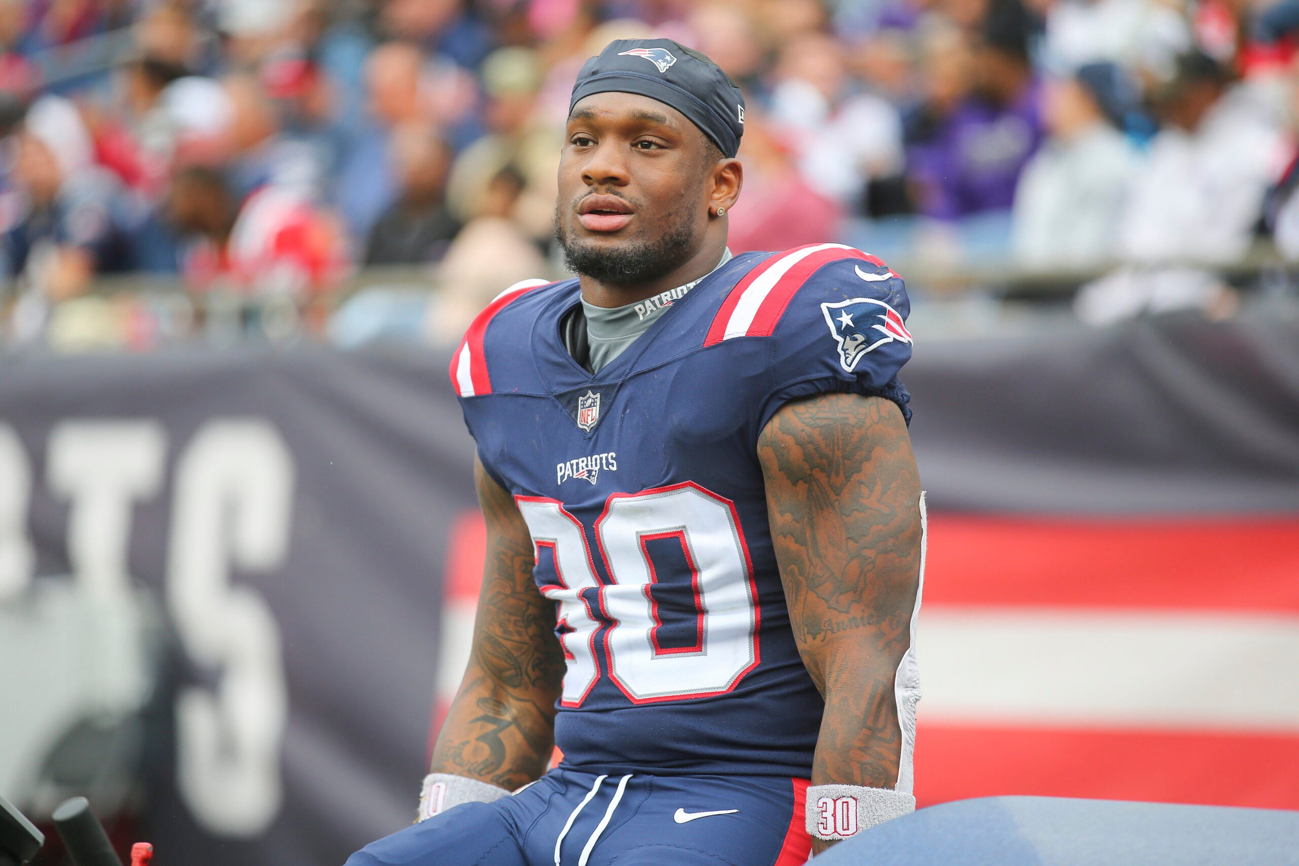 Mack Wilson on the sideline during a Patriots-Ravens game in 2022.