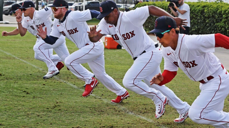 With Red Sox pitcher Nick Pivetta (not pictured) dropping out of the World Baseball Classic, that leaves only five Boston position players who will be taking part. They have been doing some exercising together at camp as a group and they are pictured as they do some sprints together on Monday. The players are (left to right) Jarren Duran, Kike Hernandez, Alex Verdugo, Rafael Devers and Masataka Yoshida.