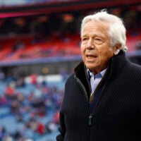 New England Patriots owner Robert Kraft walks the field during practice before an NFL football game against the Buffalo Bills, Sunday, Jan. 8, 2023, in Orchard Park, N.Y