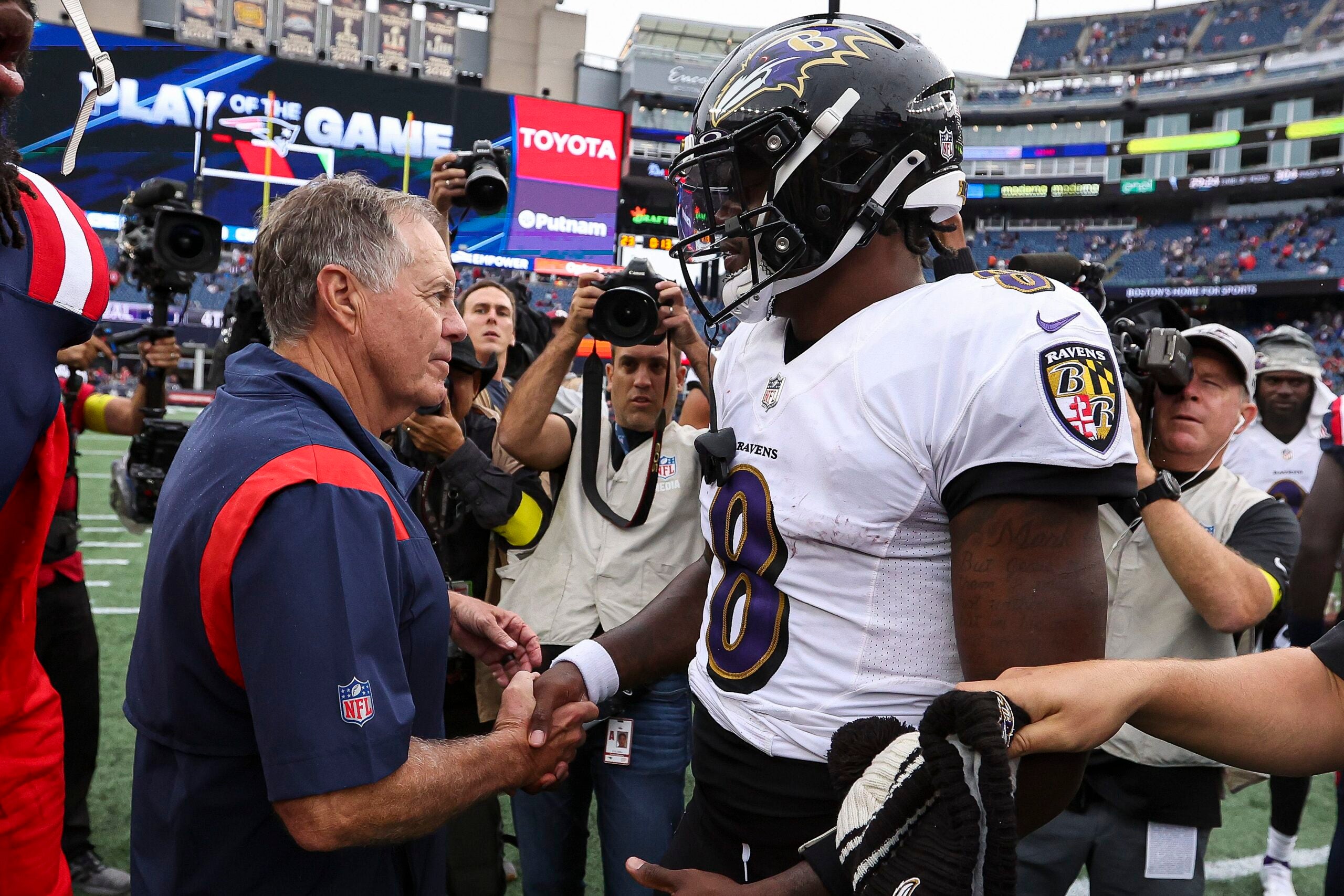 Bill Belichick with Lamar Jackson after a game.