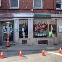 Fans waited outside Bova's Bakery hoping to see Matt Damon and Casey Affleck film scenes from their upcoming movie "The Instigators."