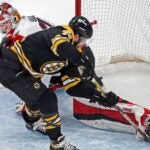 The Bruins Jake DeBrusk slipped the puck past the outstretched leg of Senators goalie Mads Sogaard