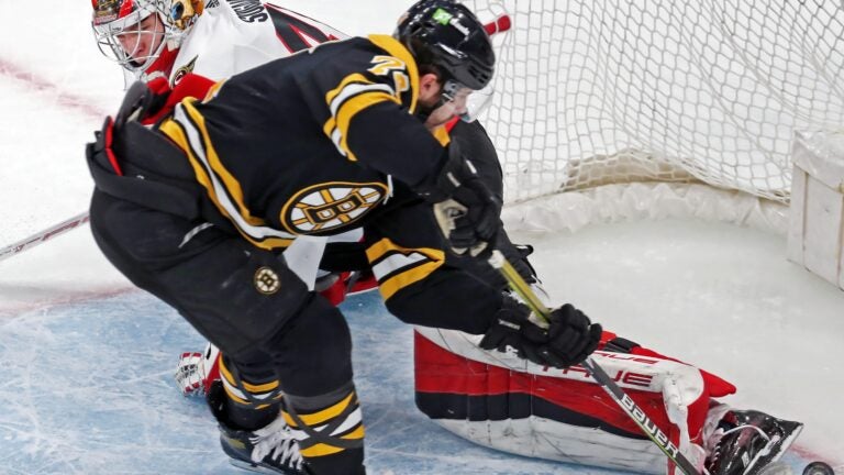The Bruins Jake DeBrusk slipped the puck past the outstretched leg of Senators goalie Mads Sogaard