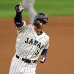 Masataka Yoshida #34 of Team Japan rounds the bases after hitting a three-run home run in the seventh inning against Team Mexico to tie the World Baseball Classic Semifinals at loanDepot park on March 20, 2023 in Miami, Florida.