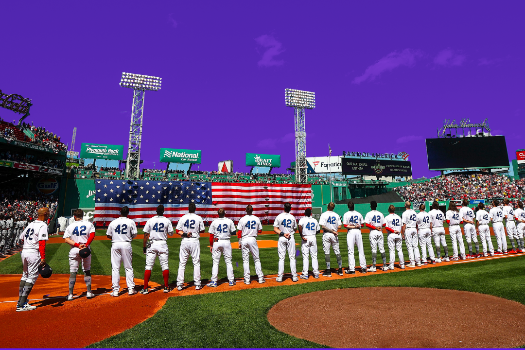 Red Sox players on Opening Day in 2022 lined up at Fenway park with a photoshopped purple sky.