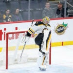 Bruins goaltender Jeremy Swayman celebrating.